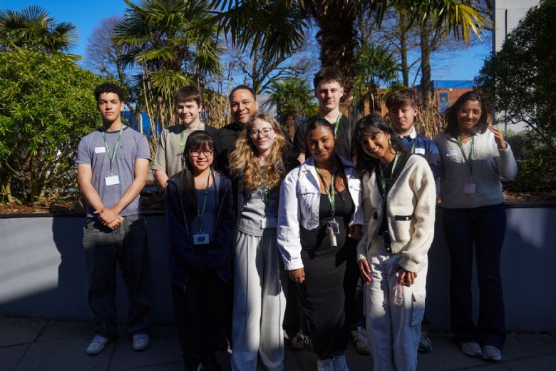 Students from The Sixth Form College Farnborough with Alex Holmes